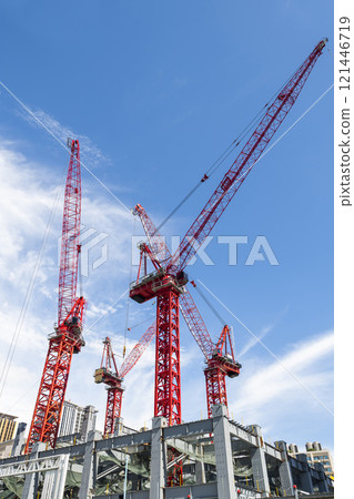 View of cranes above steel structure for building construction in Taiwan. View of cranes above steel structure for building construction in Taiwan. 121446719
