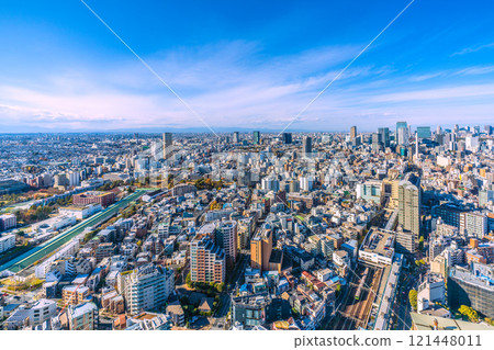 Tokyo cityscape, Japan. Year-end Tokyo City View. Overlooking Shibuya's office buildings, Shibuya Aqsyu, the Yamanote Line, etc. Tokyo cityscape, Japan. Year-end Tokyo City View. Overlooking Shibuya's office buildings, Shibuya Aqsyu, the Yamanote Line, etc. 121448011