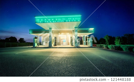 Neon lights brighten the eco gas station at night, showcasing its modern design and landscape 121448188