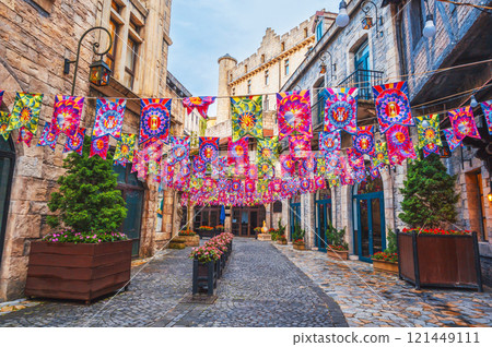 Decorated festive streets of medieval stone city in French village in Ba Na Hills Park in Da Nang in Vietnam 121449111