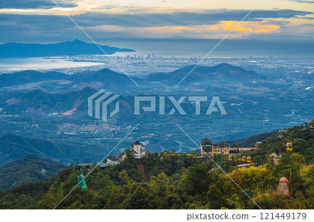 Top view of Da Nang city from mountain in Ba Na Hills in Vietnam at sunset Top view of Da Nang city from mountain in Ba Na Hills in Vietnam at sunset 121449179