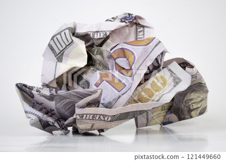 Crumpled hundred dollar bill on a white background. High quality photo Crumpled hundred dollar bill on a white background. High quality photo 121449660