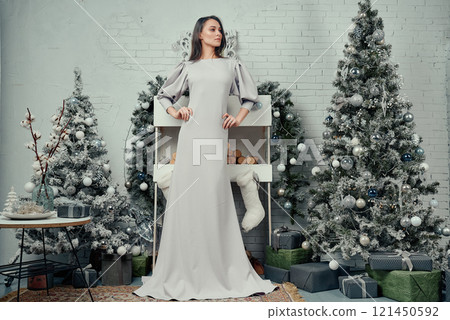 Graceful Woman in Elegant Winter Setting. Graceful Woman in Elegant Winter Setting. 121450592