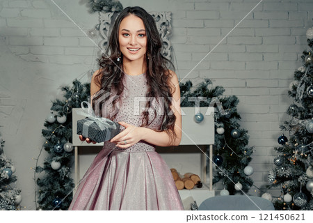 Elegant Woman Posing With Gift Box. 121450621