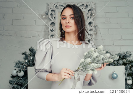 Sophisticated Woman in Grey Dress with Frosted Bouquet. 121450634