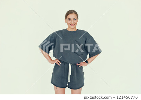 Smiling Fitness Trainer in Casual Sports Outfit. Smiling Fitness Trainer in Casual Sports Outfit. 121450770