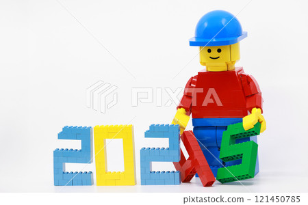 workers set up the new year 2025 wording 121450785