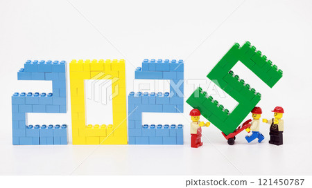 workers set up the new year 2025 wording 121450787