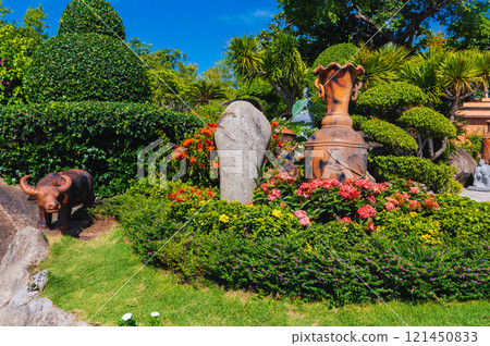 Asian garden with decor in pagoda in Vietnam in Asia Asian garden with decor in pagoda in Vietnam in Asia 121450833
