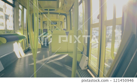 A modern French city tram interior on a sunny day, Grenoble. Ecological public transportation service 121450946