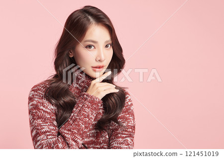 Beautiful young asian woman with clean fresh skin on pink background, Face care, Facial treatment, Cosmetology, beauty and spa, Asian women portrait. 121451019