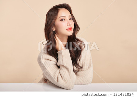 Beautiful young asian woman with clean fresh skin on beige background, Face care, Facial treatment, Cosmetology, beauty and spa, Asian women portrait. 121451024