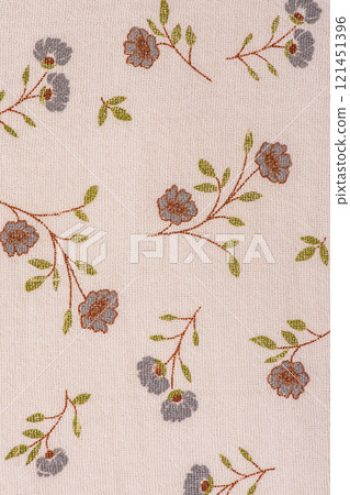 Texture of beige flower fabric. Cotton as a background 121451396