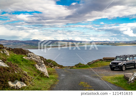 The coastal single track road between Meenacross and Crohy Head south of Dungloe, County Donegal - Ireland The coastal single track road between Meenacross and Crohy Head south of Dungloe, County Donegal - Ireland 121451635