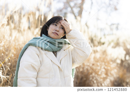 Woman with cold symptoms Woman with cold symptoms 121452880