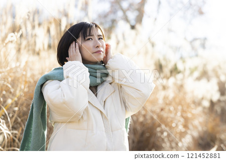 Woman with cold symptoms 121452881