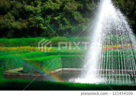 Fountain and rainbow landscape 121454100