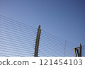 Blue sky and electric wire 121454103