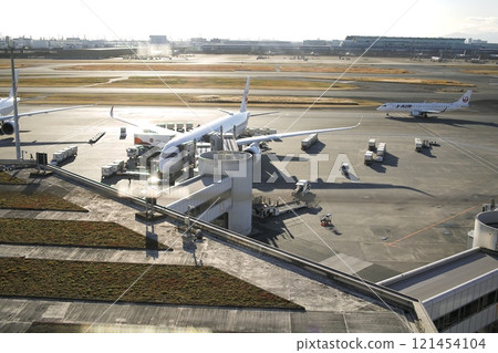Airplane in preparation for takeoff 121454104