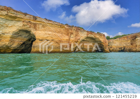 Majestic Coastal Cliffs and Sea Caves in Algarve, Portugal. Majestic Coastal Cliffs and Sea Caves in Algarve, Portugal. 121455219