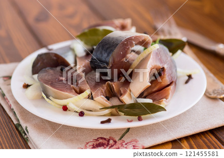 lightly salted mackerel with onions and spices, in a plate lightly salted mackerel with onions and spices, in a plate 121455581