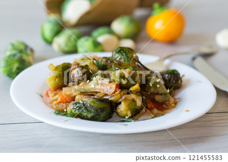 Brussel sprouts cooked with vegetables and spices Brussel sprouts cooked with vegetables and spices 121455583