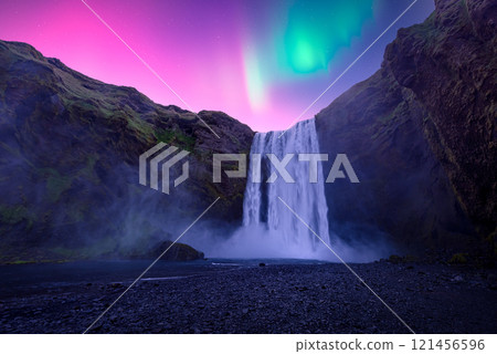 Aurora Borealis over famous Skogafoss waterfall on Skoga river 121456596