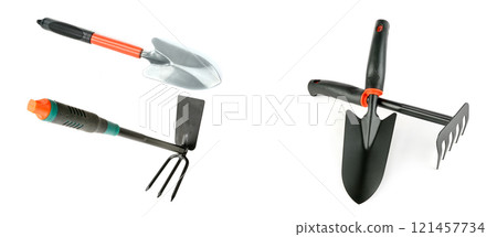 Gardening tools set, garden kit, Shovel, Trowel, Fork with plastic handle isolated on white background. Banner for soil planting work or sale vegetable garden products. 121457734