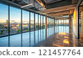 Modern empty office space with panoramic city view at sunset. 121457764