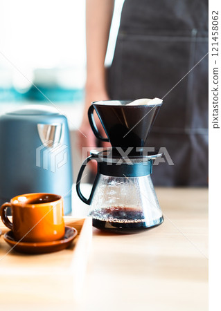 Man enjoying authentic coffee at home (no face) 121458062