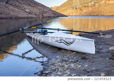 coastal sculling shell in sandstone canyon of Horsetooth Reservoir in Colorado in fall scenery 121458323