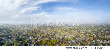 foggy October sunrise over Fort Collins and foothills in northern Colorado, aerial panorama 121458552