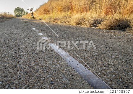 railroad tracks remains on Great Western Bike Trail, rails to trails conversion project in northeastern rural Colorado 121458567