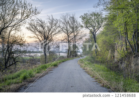 Steamboat Trace, bike trail converted from an abandoned railroad, near Peru, Nebraska, springtime morning scenery Steamboat Trace, bike trail converted from an abandoned railroad, near Peru, Nebraska, springtime morning scenery 121458688