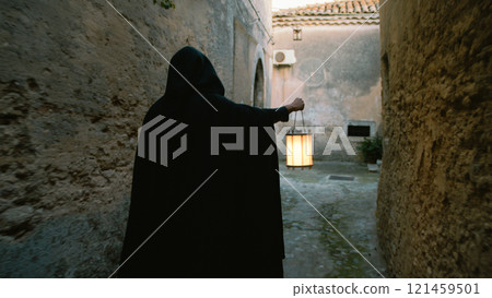 Obscure Figure Wanders Through Ancient alleys Obscure Figure Wanders Through Ancient alleys 121459501