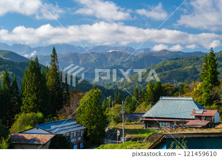 Gotateyama mountain range and farmhouse 121459610