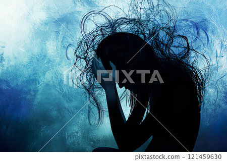 Silhouette of a woman in distress with head in hands, symbolizing stress, abstract blue background. 121459630
