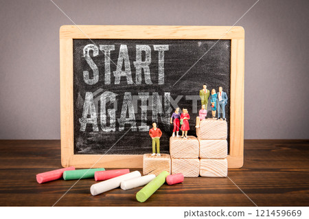 Start Again motivational reminder. Miniature chalkboard with text and human figures 121459669