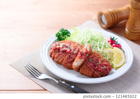 Pork cutlet with tomato sauce 121465022