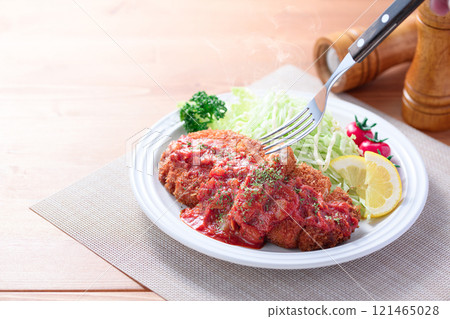 Pork cutlet with tomato sauce 121465028
