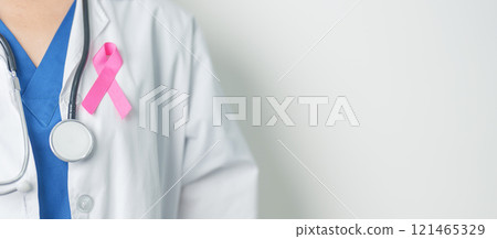 Pink October Breast Cancer Awareness month, woman doctor with pink Ribbon in hospital for support people life and illness. National cancer survivors month, Mother and World cancer day concept Pink October Breast Cancer Awareness month, woman doctor with pink Ribbon in hospital for support people life and illness. National cancer survivors month, Mother and World cancer day concept 121465329