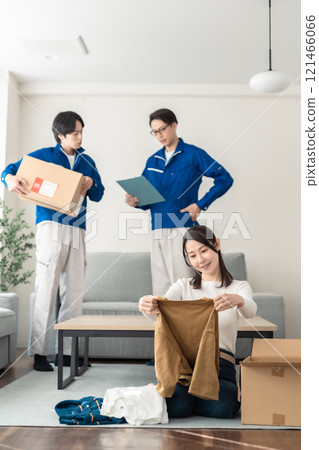 Housewives still packing boxes even though it's time to collect their luggage Housewives still packing boxes even though it's time to collect their luggage 121466066