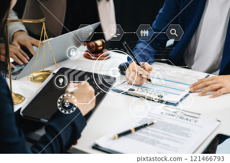 Copyright or patent concept, Business team analyzing data and using smart phone and tablet with virtual screen 121466793