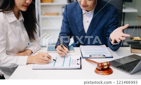 Business and Male lawyer or judge consult having team meeting with client, Law and Legal services concept.Customer service good cooperation ie Business and Male lawyer or judge consult having team meeting with client, Law and Legal services concept.Customer service good cooperation ie 121466993