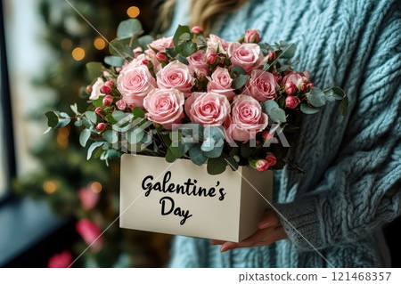 a box with a bouquet of pink roses and the inscription Galentine's Day, preparing to meet friends 121468357