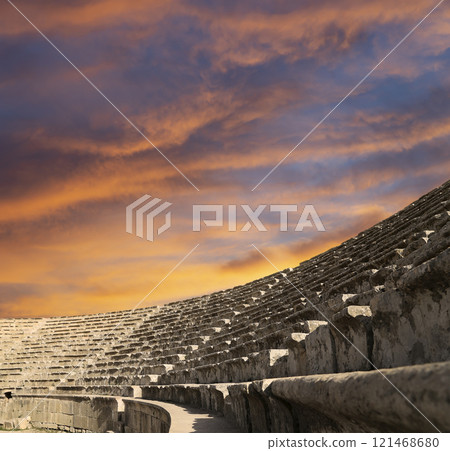 Amphitheater in Jerash (Gerasa of Antiquity), capital and largest city of Jerash Governorate, Jordan. Against the background of a beautiful sky with clouds Amphitheater in Jerash (Gerasa of Antiquity), capital and largest city of Jerash Governorate, Jordan. Against the background of a beautiful sky with clouds 121468680
