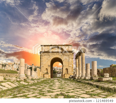 Roman ruins (against the background of a beautiful sky with clouds) in the Jordanian city of Jerash (Gerasa of Antiquity), capital and largest city of Jerash Governorate, Jordan Roman ruins (against the background of a beautiful sky with clouds) in the Jordanian city of Jerash (Gerasa of Antiquity), capital and largest city of Jerash Governorate, Jordan 121469549
