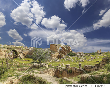 Roman ruins (against the background of a beautiful sky with clouds) in the Jordanian city of Jerash (Gerasa of Antiquity), capital and largest city of Jerash Governorate, Jordan Roman ruins (against the background of a beautiful sky with clouds) in the Jordanian city of Jerash (Gerasa of Antiquity), capital and largest city of Jerash Governorate, Jordan 121469560