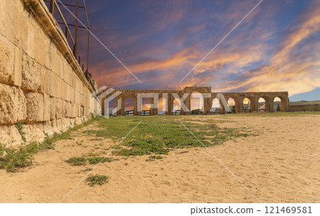 Roman ruins (against the background of a beautiful sky with clouds) in the Jordanian city of Jerash (Gerasa of Antiquity), capital and largest city of Jerash Governorate, Jordan Roman ruins (against the background of a beautiful sky with clouds) in the Jordanian city of Jerash (Gerasa of Antiquity), capital and largest city of Jerash Governorate, Jordan 121469581
