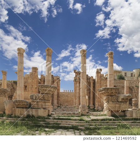Roman ruins (against the background of a beautiful sky with clouds) in the Jordanian city of Jerash (Gerasa of Antiquity), capital and largest city of Jerash Governorate, Jordan Roman ruins (against the background of a beautiful sky with clouds) in the Jordanian city of Jerash (Gerasa of Antiquity), capital and largest city of Jerash Governorate, Jordan 121469592